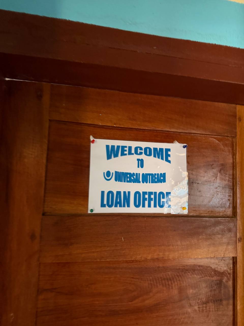 Welcome to Universal Outreach Loan Office sign