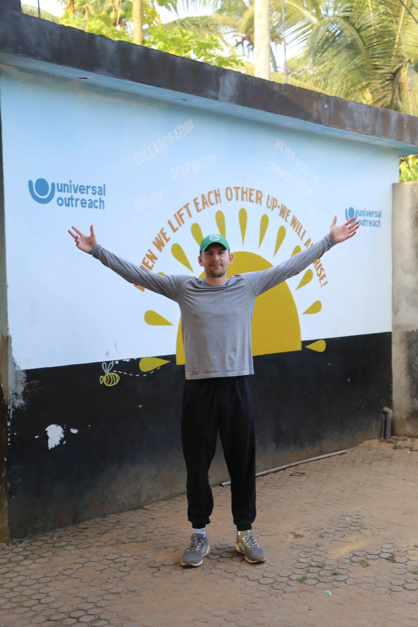 UOF compound mural — When we lift each other up, we will all rise